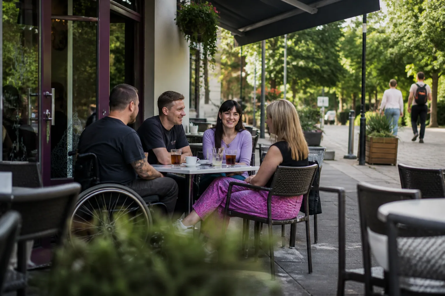 Adults talking over drinks at a relaxed venue in Woking town centre